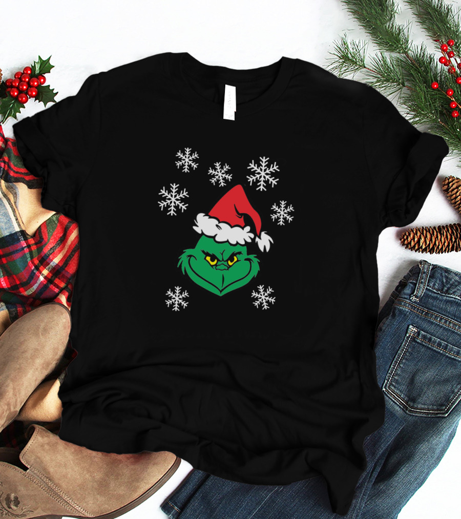 Grinch Face With Santa Hat Surrounded By Snowflakes Iconic Holiday Character T-Shirt