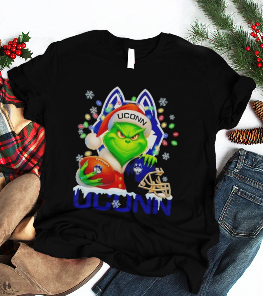 Grinch Wearing Santa Hat With UConn Huskies Football And Helmet Merry Christmas T-Shirt