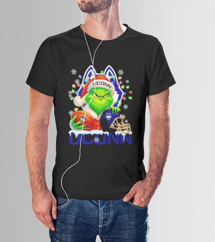 Grinch Wearing Santa Hat With UConn Huskies Football And Helmet Merry Christmas T-Shirt