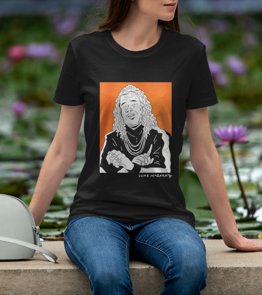 Luke McGarry Cartoon Character With Long Hair And Chains On Orange T-Shirt