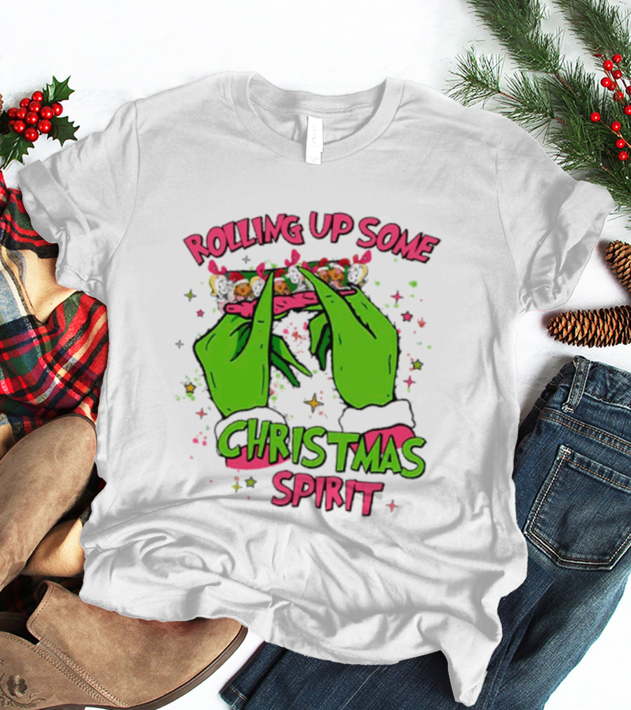 Grinch Rolling Up Some Christmas Spirit With Green Hands And Glitter Stars T-Shirt