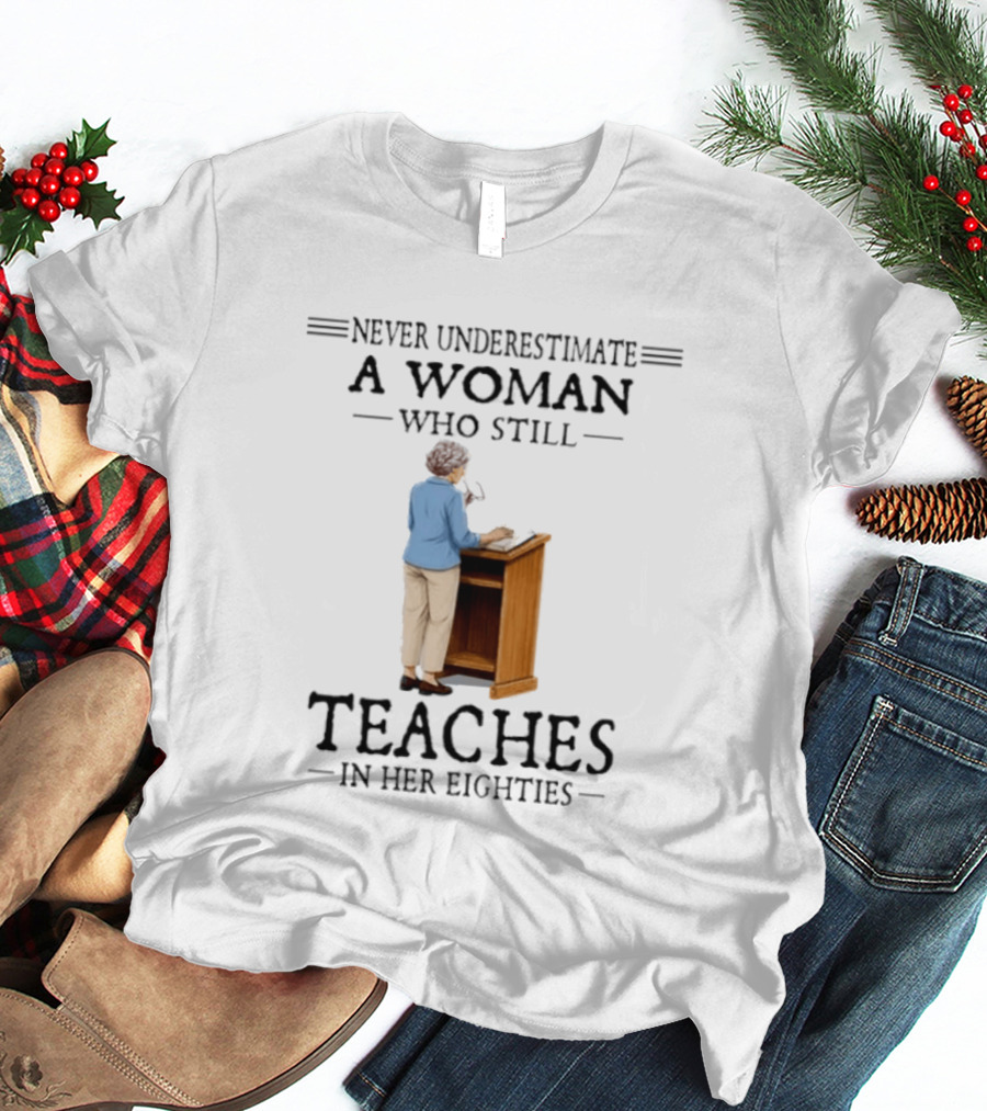 Never Underestimate A Woman Who Still Teaches In Her Eighties 2026 T-Shirt