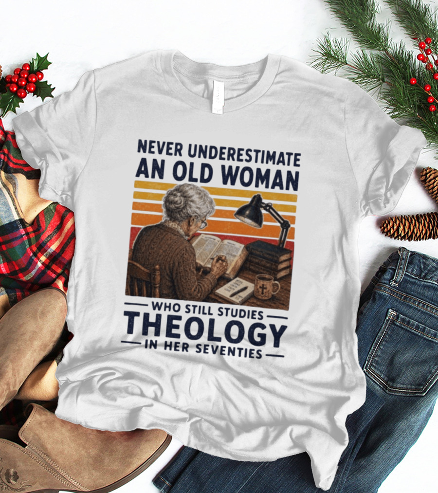 Never Underestimate An Old Woman Who Studies Theology In Her Seventies With Books And Lamp T-Shirt