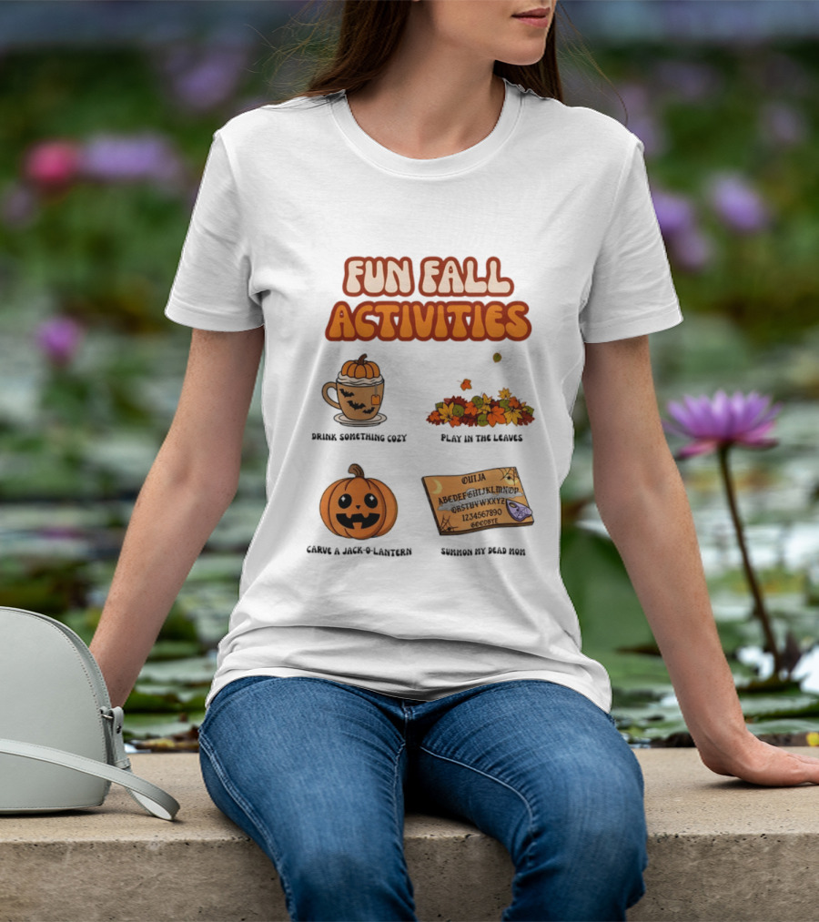 Fun Fall Activities Halloween Drink Something Cozy Ouija Board Carve A Jack O Lantern Play In The Leaves T-Shirt