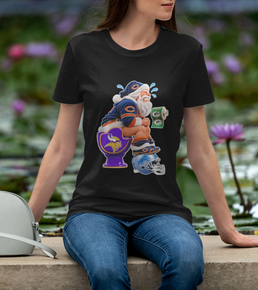 Santa Claus On Toilet Minnesota Vikings Detroit Lions Green Bay Packers Chicago Bears Funny Christmas 2026 Football T-Shirt