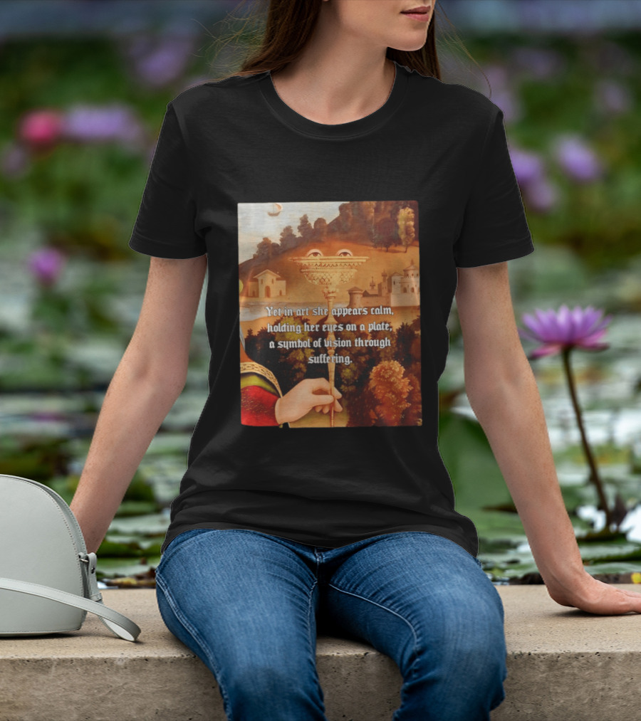 Yet In Art She Appears Calm Holding Her Eyes On A Plate A Symbol Of Vision Through Suffering T-Shirt