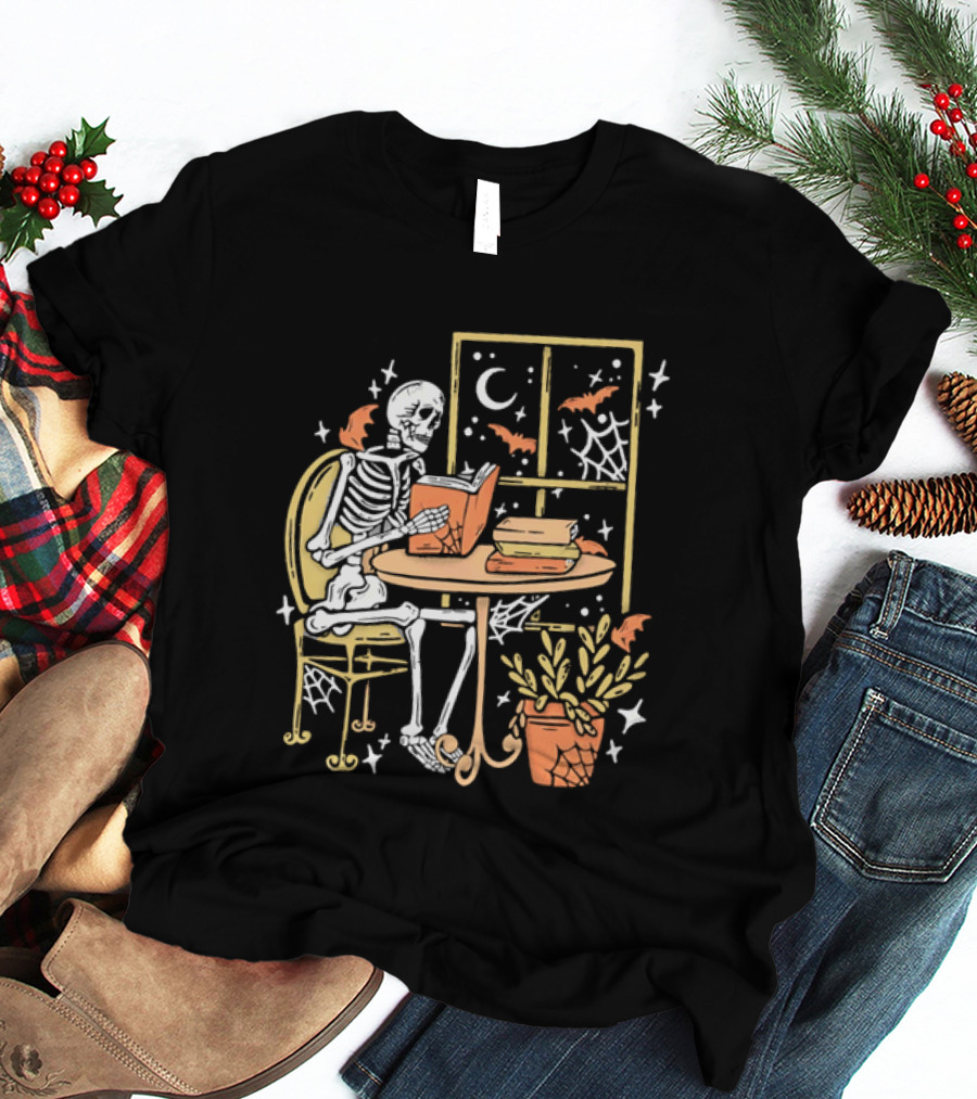 Cartoon Skeleton Reading Under Crescent Moon With Bats Orange Book Table Window T-Shirt