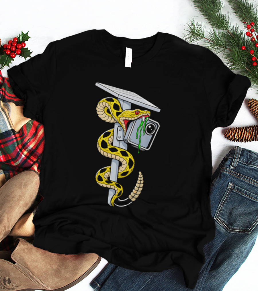 Cartoon Yellow Rattlesnake Biting Security Camera Solar Panel Pole Dripping Venom T-Shirt