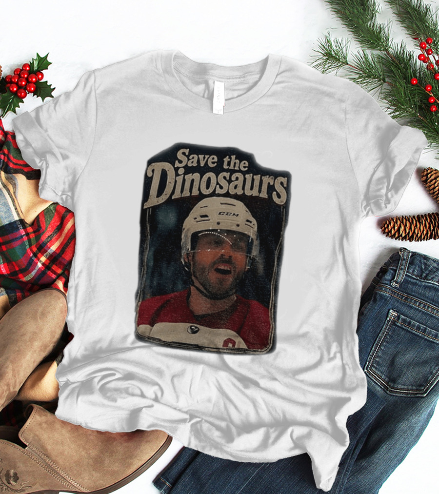 Connor Storrie Wearing Scott Hunter Save The Dinosaurs CCM Hockey T-Shirt