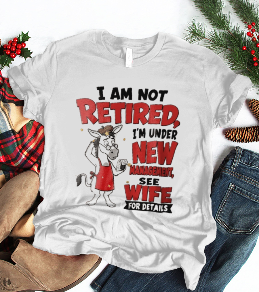 I Am Not Retired I'm Under New Management See Wife For Details Cartoon Donkey Red Apron T-Shirt
