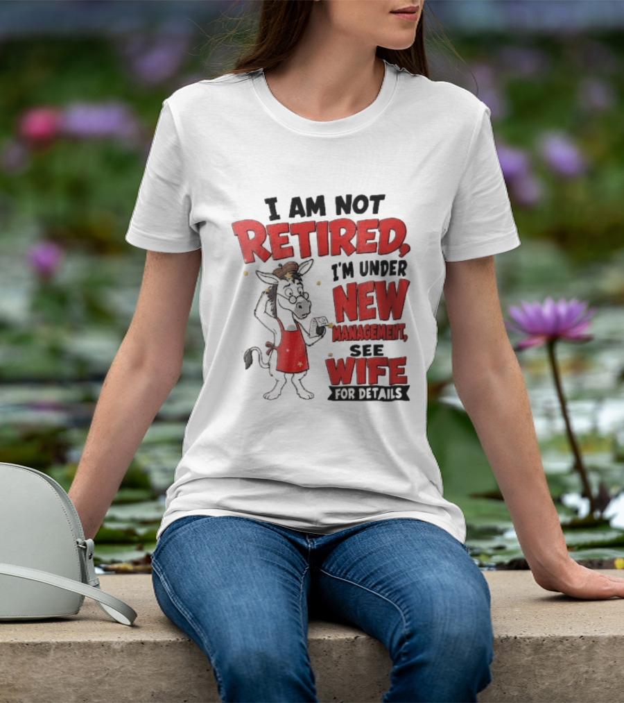 I Am Not Retired I'm Under New Management See Wife For Details Cartoon Donkey Red Apron T-Shirt