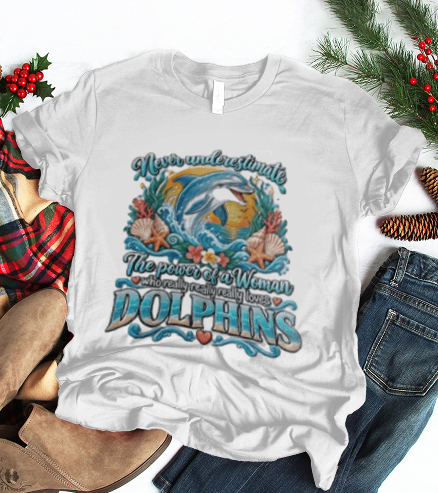 Never Underestimate The Power Of A Woman Who Really Loves Dolphins Ocean Waves Sunburst Shells T-Shirt