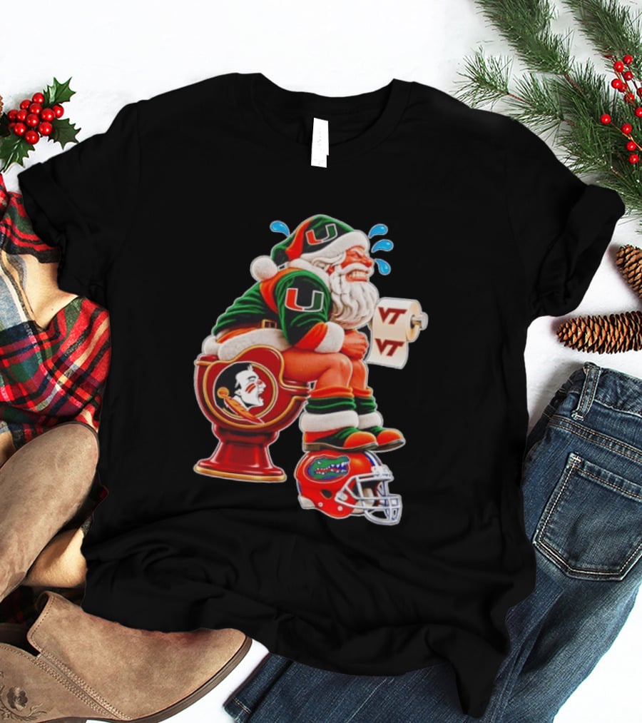 Miami Hurricanes Santa Claus Laughing On Florida State Toilet With Virginia Tech Toilet Paper And Florida Gators Helmet T-Shirt