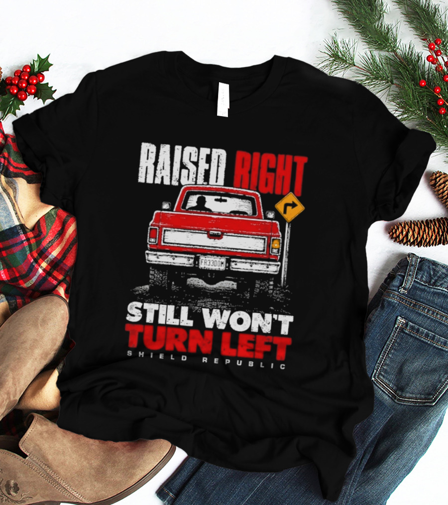 Raised Right Still Won't Turn Left Shield Republic Truck Back View With Right Turn Sign T-Shirt