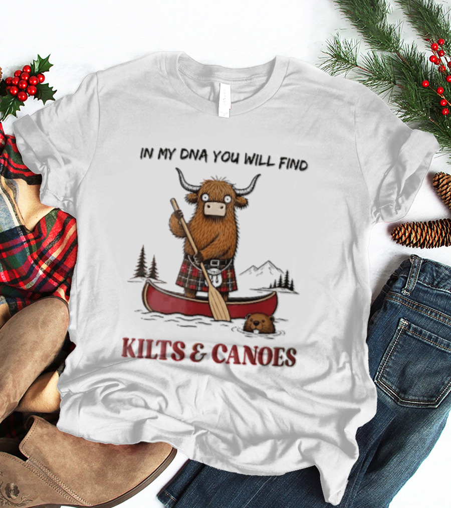 In My DNA You Will Find Kilts And Canoes Cartoon Highland Cow Paddling T-Shirt