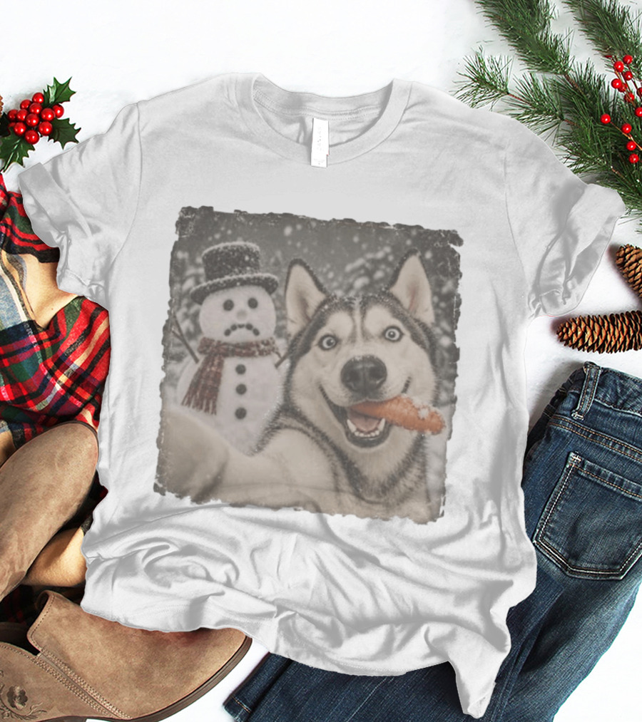 A Sled Dog With A Carrot And A Sad Snowman In A Snowy Winter Scene T-Shirt