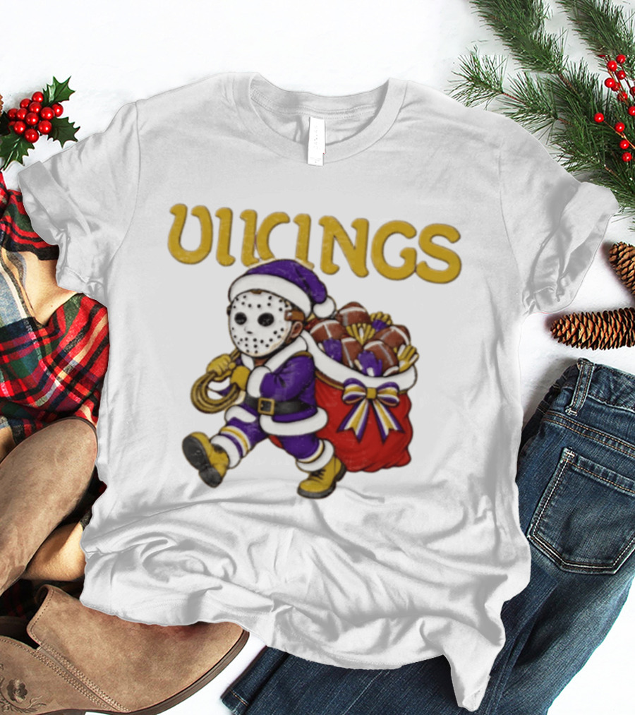 Minnesota Vikings Football Christmas Purple And Gold Santa Carrying Footballs T-Shirt