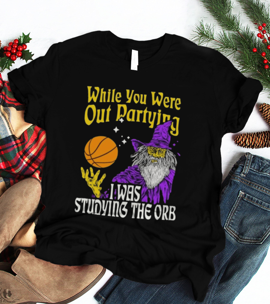While You Were Out Partying I Was Studying The Orb Wizard Basketball T-Shirt