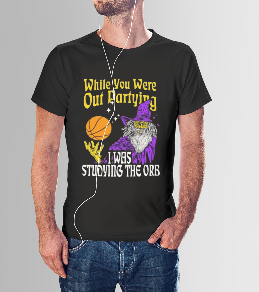 While You Were Out Partying I Was Studying The Orb Wizard Basketball T-Shirt
