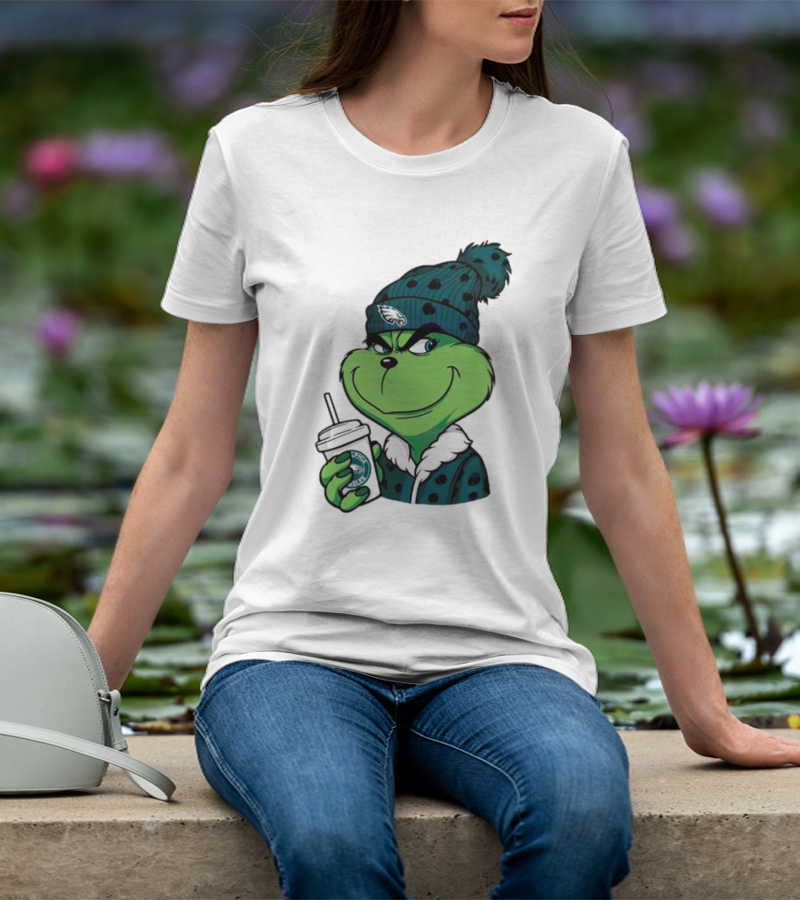 Grinch Holding Cup Wearing Philadelphia Eagles Beanie T-Shirt
