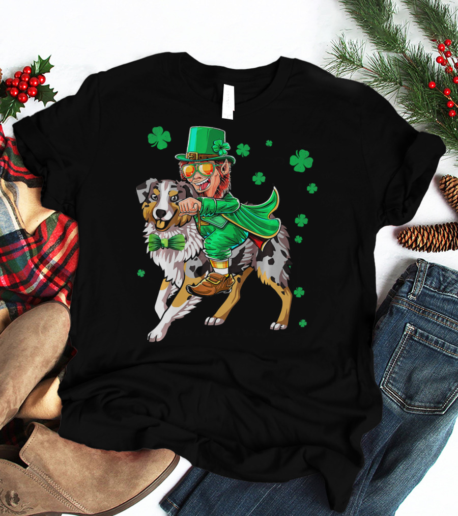 Leprechaun Riding Australian Shepherd With Shamrock Bow Tie And Clover Background T-Shirt